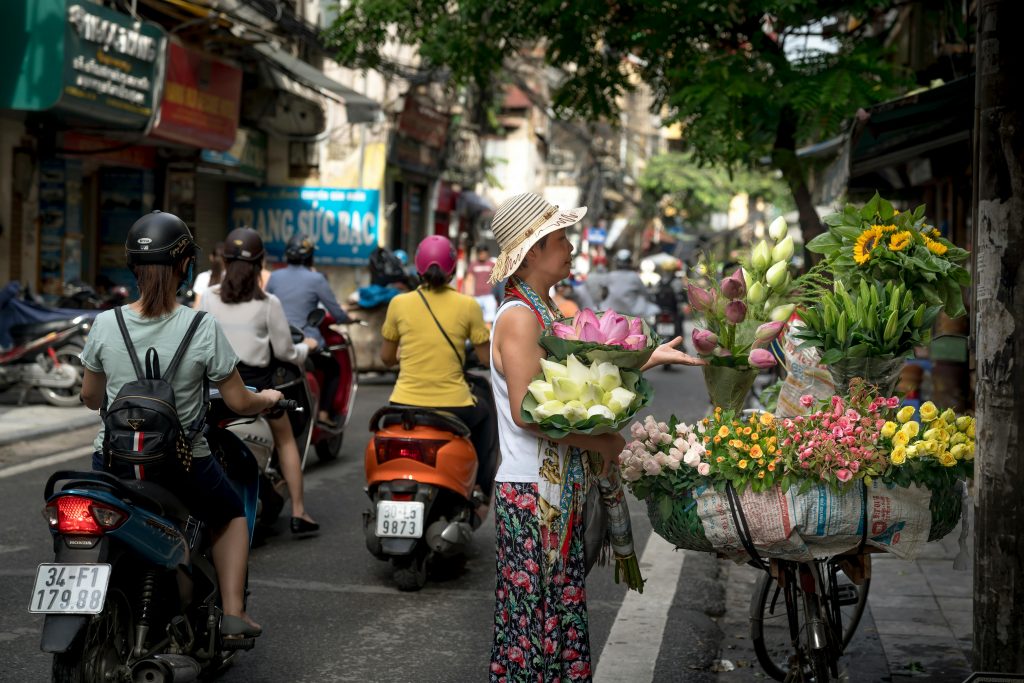 woman buying Holding Flowers Bouquet