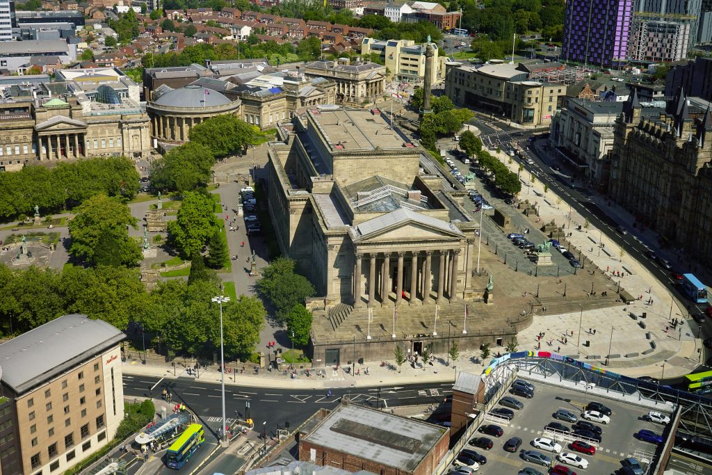 Aerial shot of the iconic St George's Hall and surrounding city architecture in Liverpool.